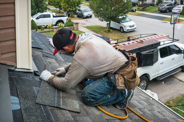 Professional Roofing technician working in Belford, NJ